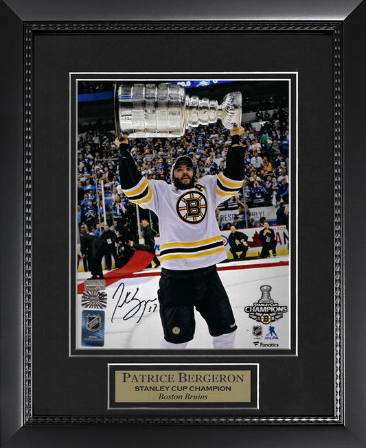Patrice Bergeron Autograph Photo Holding Stanley Cup 2011 11x14