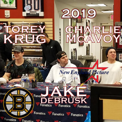 Torey Krug, Charlie McAvoy & Jake DeBrusk