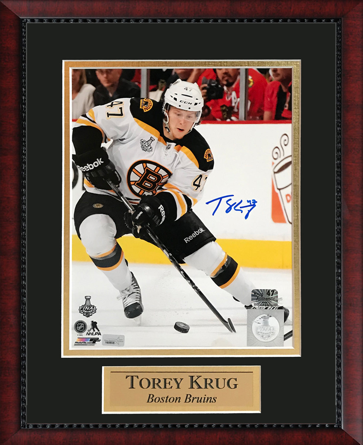 Torey Krug Autograph photo skate 11x14