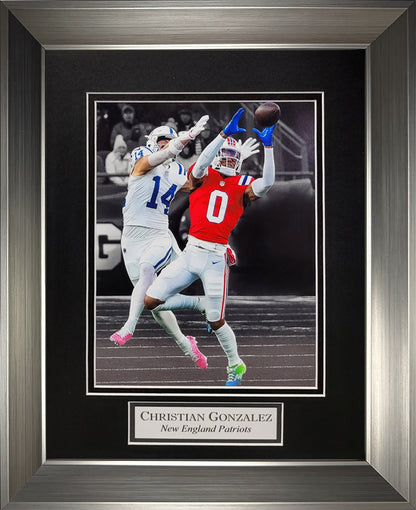 Christian Gonzalez Photograph - Interception Spotlight - New England Patriots - Framed 13x16