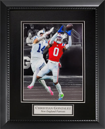 Christian Gonzalez Photograph - Interception Spotlight - New England Patriots - Framed 13x16