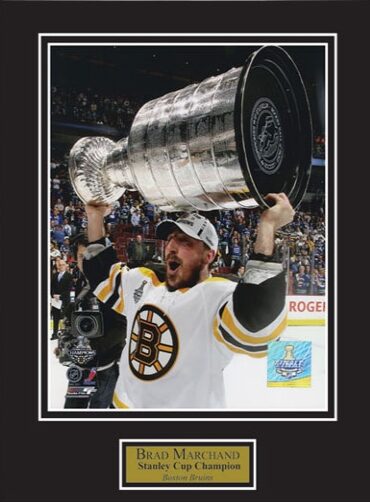 https://www.newenglandpicture.com/wp-content/uploads/2019/12/marchand-hold-stanley-cup-e1592408172412.jpg